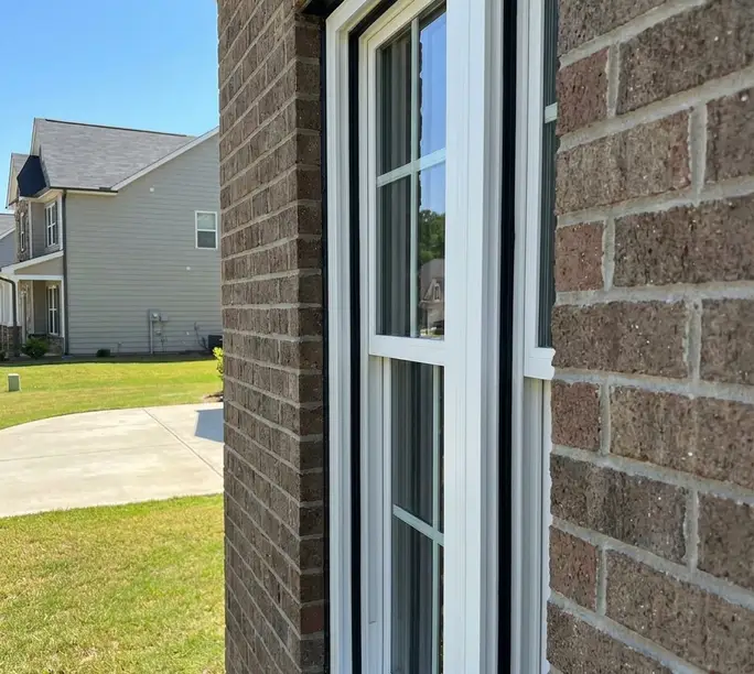 Double-hung window pulled tight against fresh seals after WowFix draft repair in Apex
