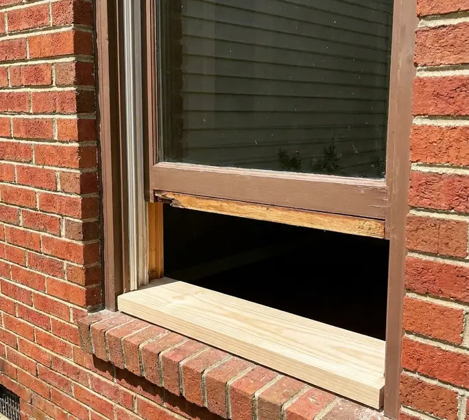 Rotted window sill on a brick Gastonia home before the WowFix wood rebuild