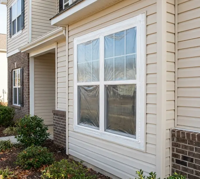 Double-hung window tuned and sealed before winter at a Cary home