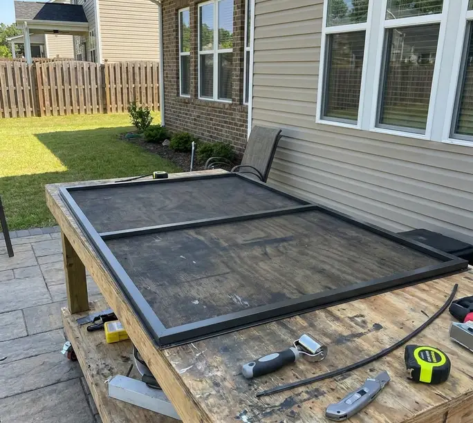 New window screen frame assembled to size on the WowFix bench for a Concord home