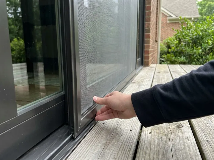 Screen door mesh rescreened under even tension