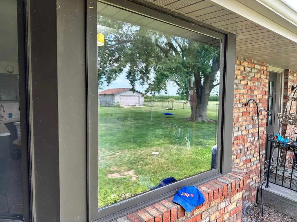 The same picture window with crystal-clear new glass restoring the view after WowFix repair