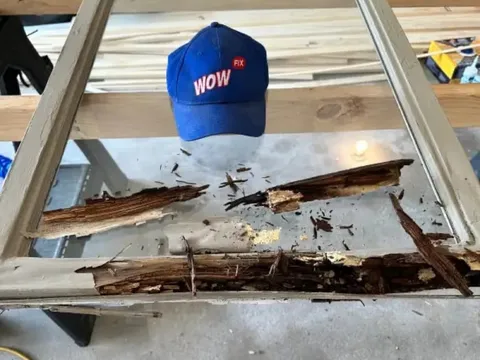 Window sash on the WowFix workbench with rotted wood cut out ready for a fabricated replacement piece