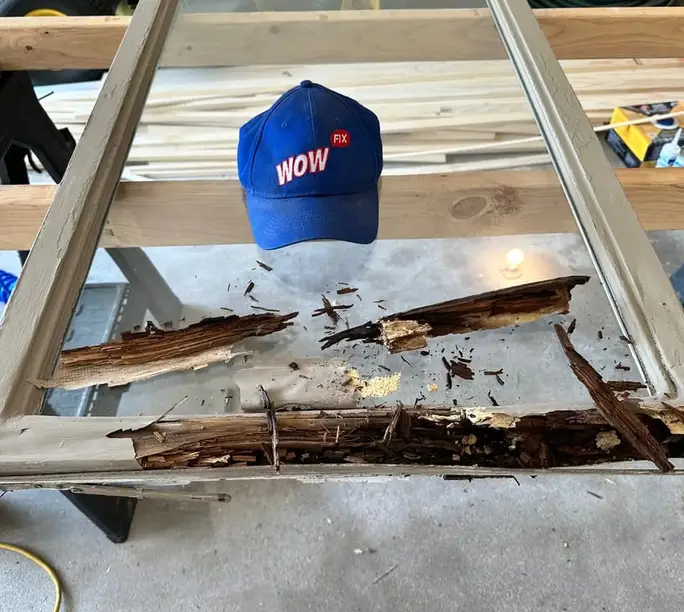 Rotted sash staged on the bench for a WowFix rebuild