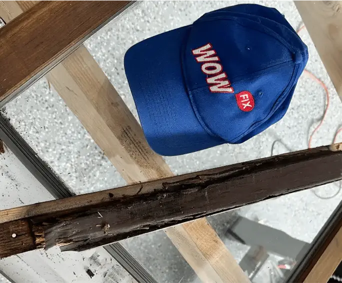 Rotted wood cut cleanly out of a window sash — one catalog line of many on the same truck