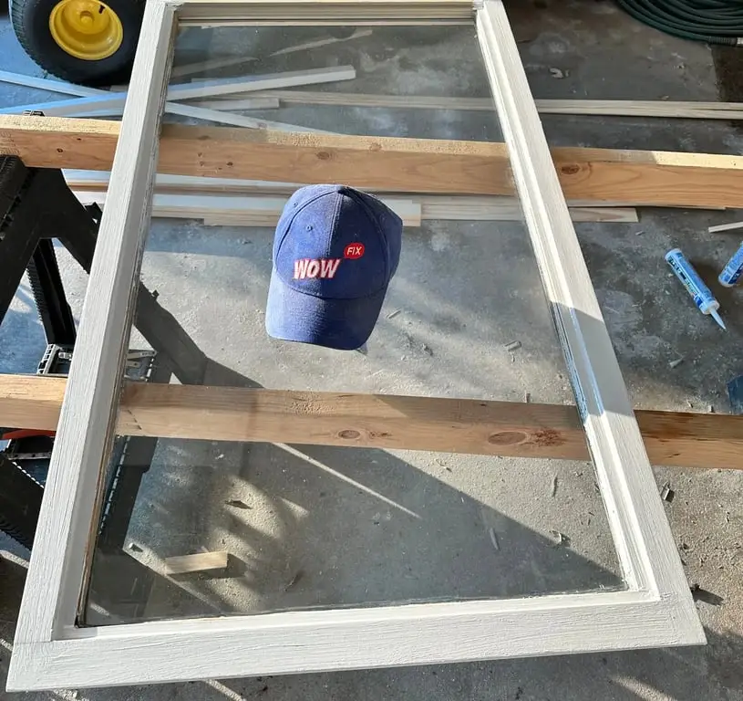 The same window sash rebuilt with a clean, painted, watertight frame after WowFix repair
