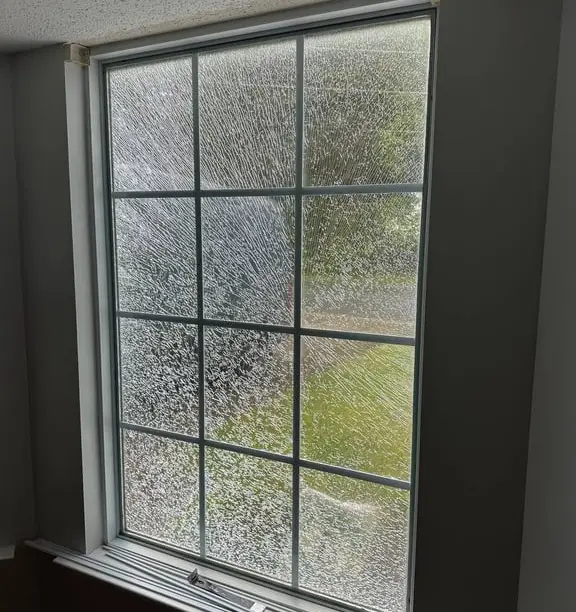 Shattered window glass from inside — why safety locations call for tempered
