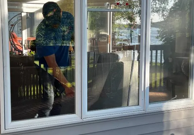 WowFix technician sealing a door from the outside