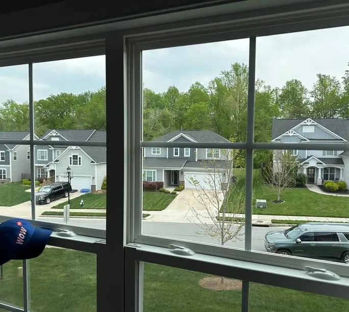 Builder-installed window serviced by WowFix — new subdivision outside