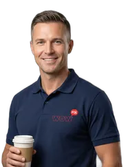 WowFix technician in a WOW FIX polo with a coffee, ready to talk