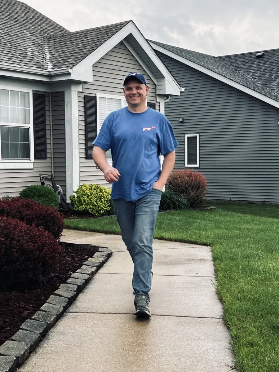 Eugene walking away from a finished job with a smile — the Wow moment