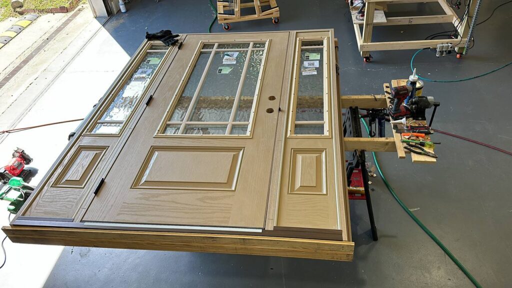 Commercial Door Repair Services 6 Home door at workshop